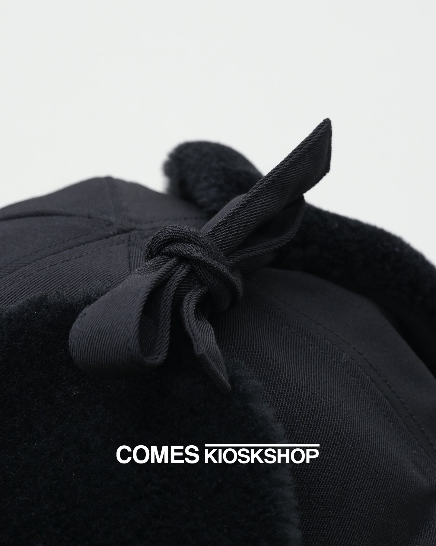 CLEAR TWILL EAR CAP 1